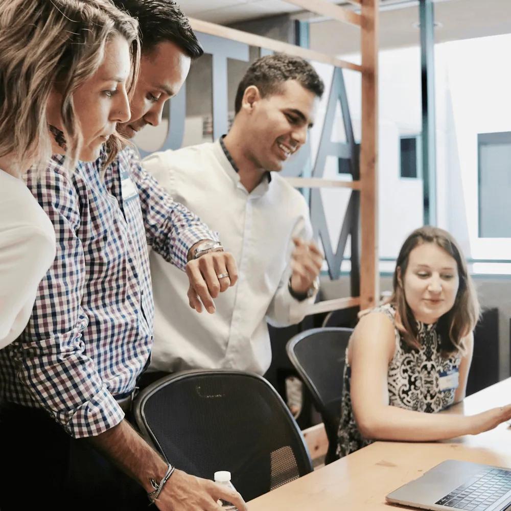 Rivermate | Employees in the office