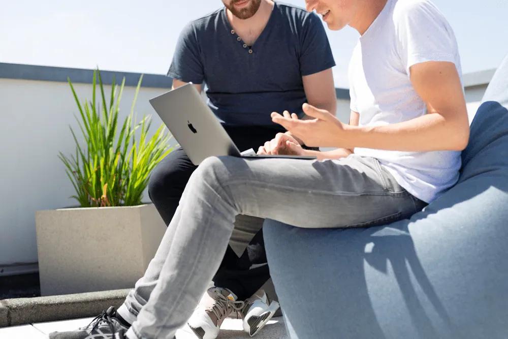 Rivermate | men with laptop